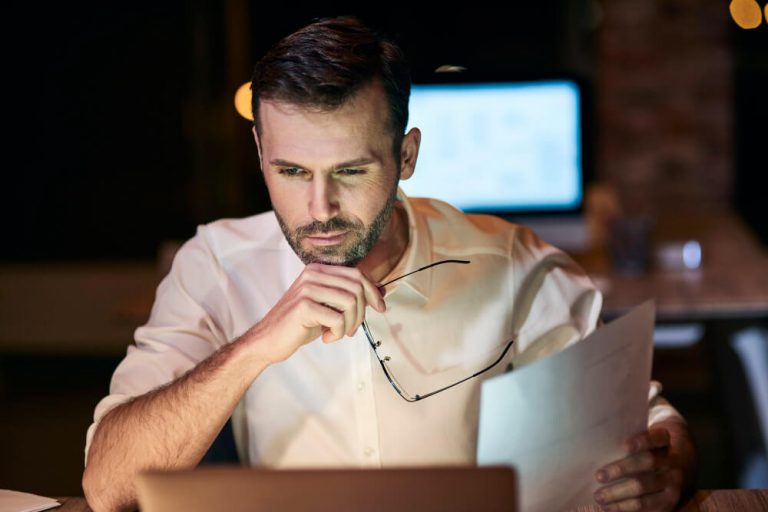 Focused Man Working Late His Home Office (1)